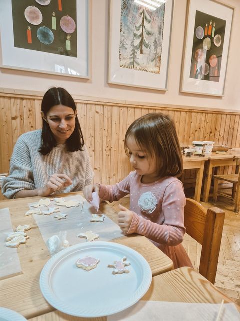 Two children working together with paper plates